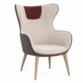 Sillón orejero de tela con patas de madera